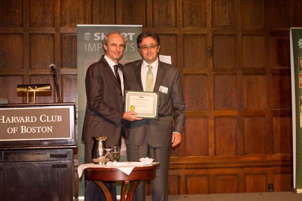 Dr. Alex Osinovsky receiving certificate from Dr. Morgan at Harvard Club of Boston