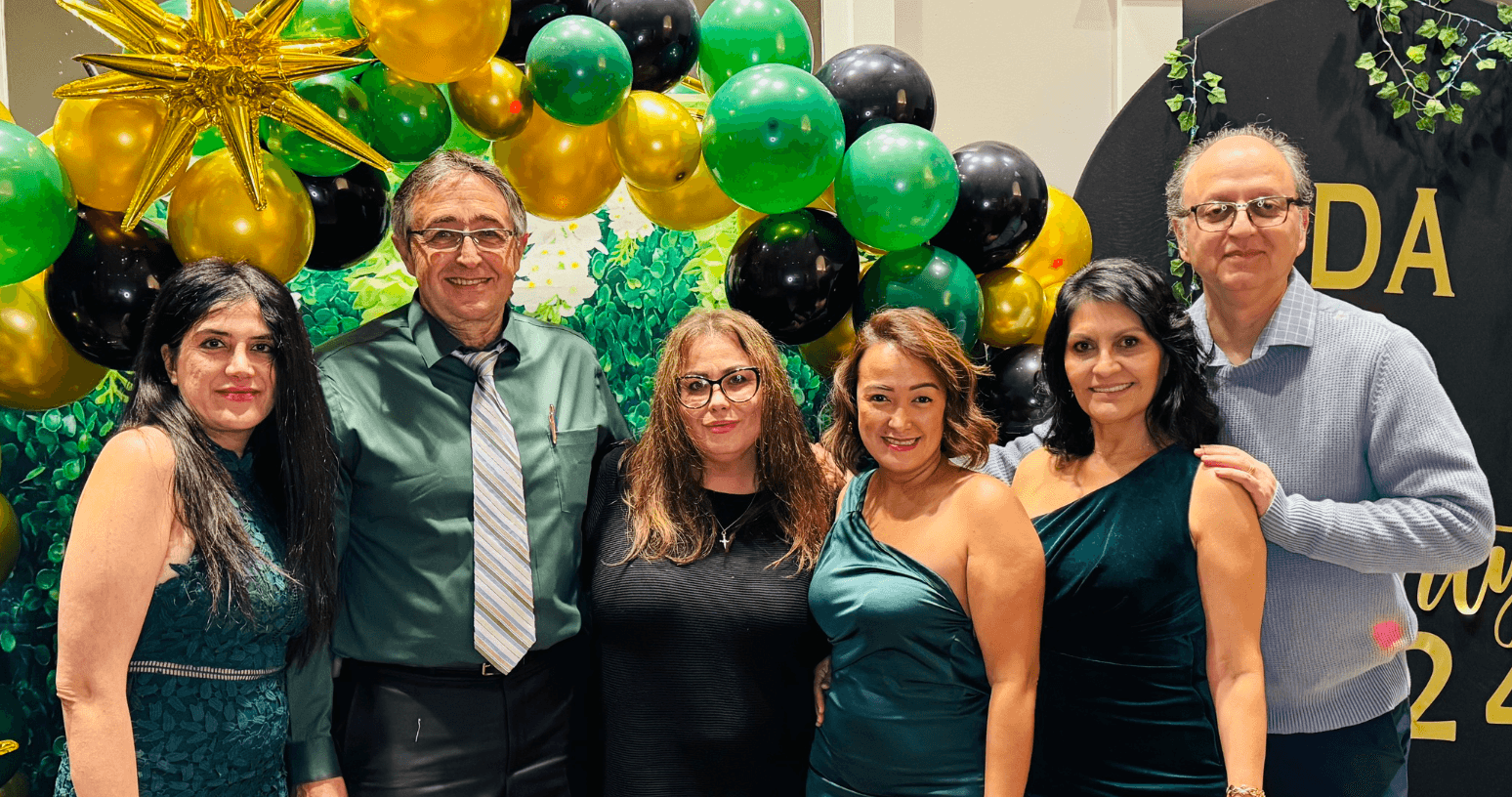 Team celebration with balloons